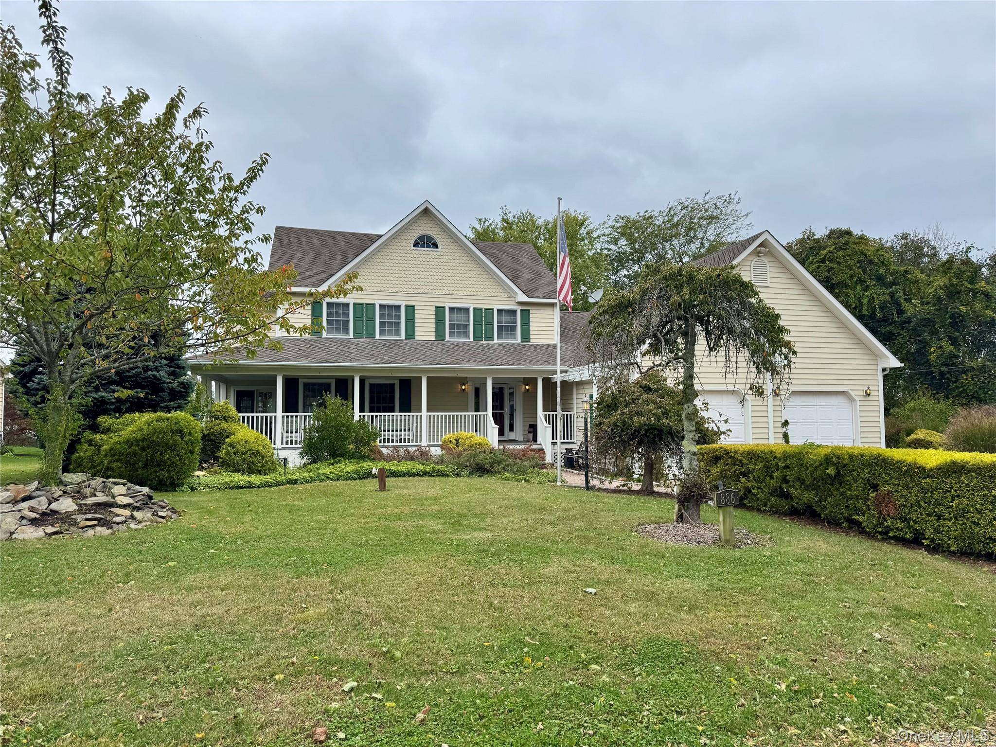 This exquisite farmhouse has deeded beach rights and is just a short stroll from the Long Island Sound located slightly west of Iron Pier Beach.