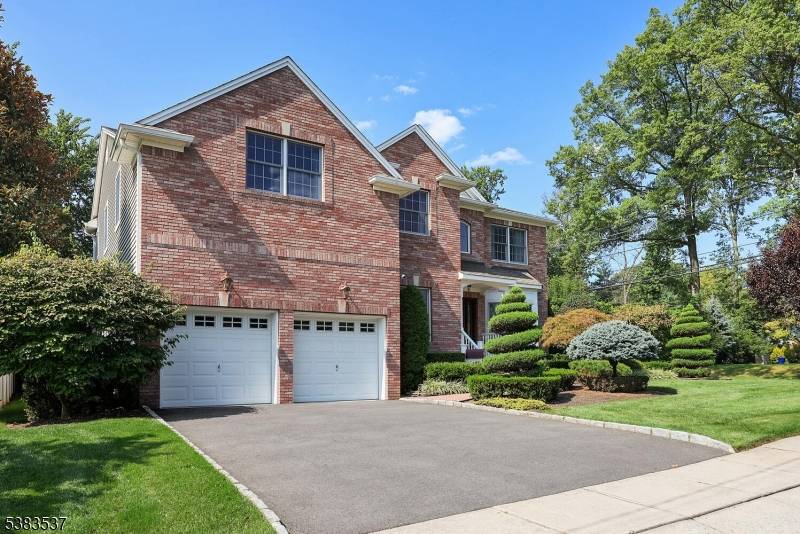 Welcome to 1 Broad St, a beautiful Colonial in the heart of Cranford.