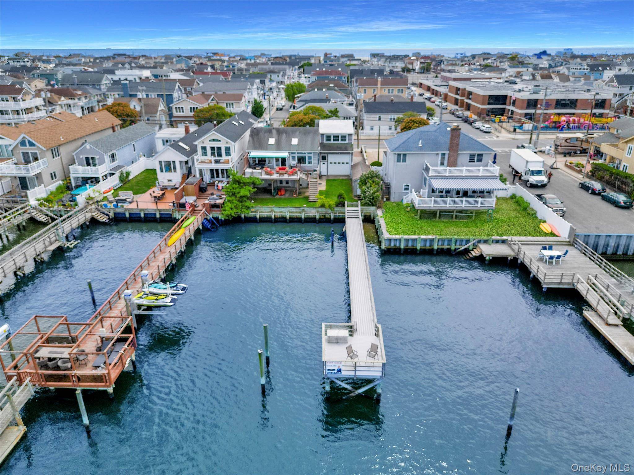 Oversized waterfront property offering landscaped privacy in the front and breathtaking open bay views with spectacular sunsets in the rear.