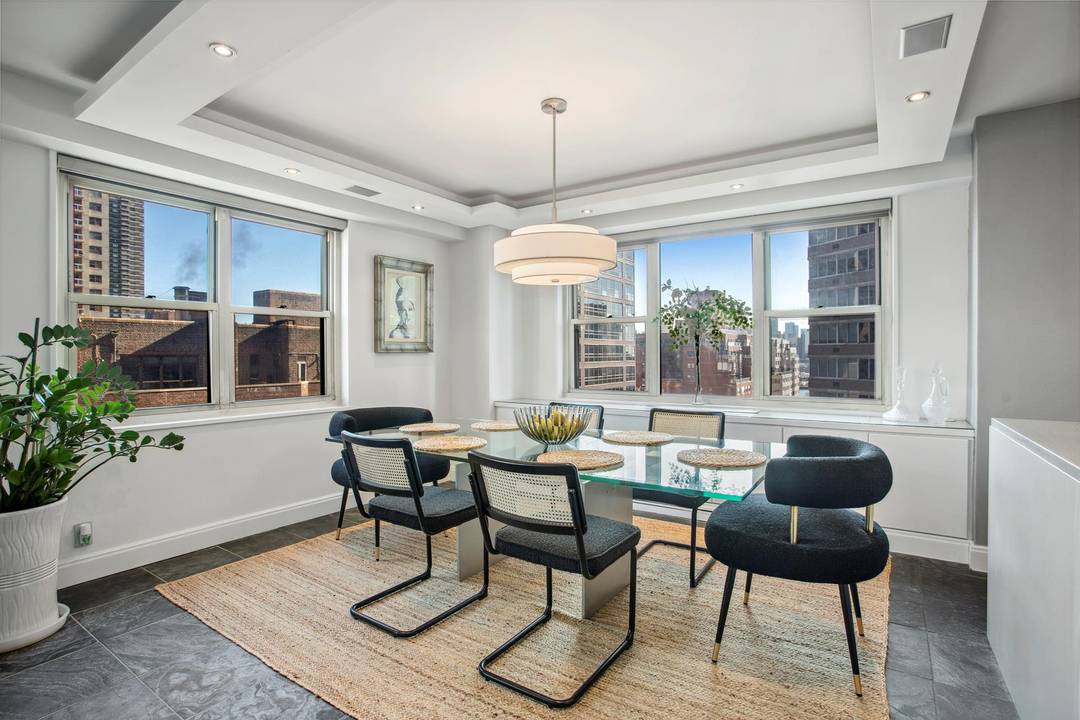 This exceptional corner unit welcomes you into a luxurious, spacious living space filled with natural light and expansive views of the New York City skyline.