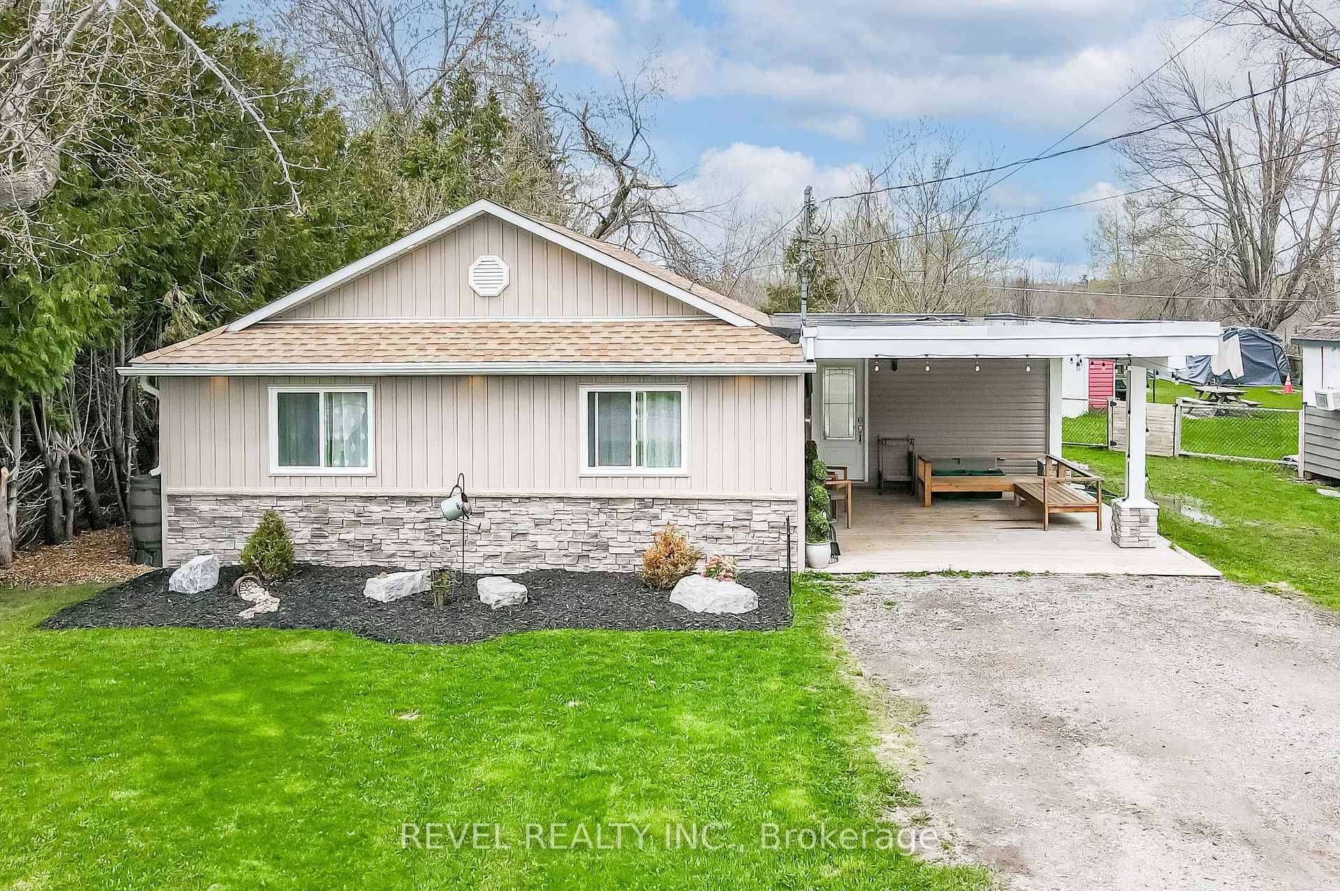 Located just footsteps from the shores of Sturgeon Lake, this fully renovated 2 bedroom, 1 bathroom bungalow is a true gem.