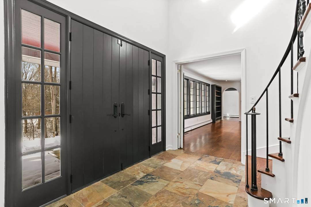 This beautiful five bedroom farmhouse in the highly sought after Old Hill area offers privacy and timeless curb appeal !