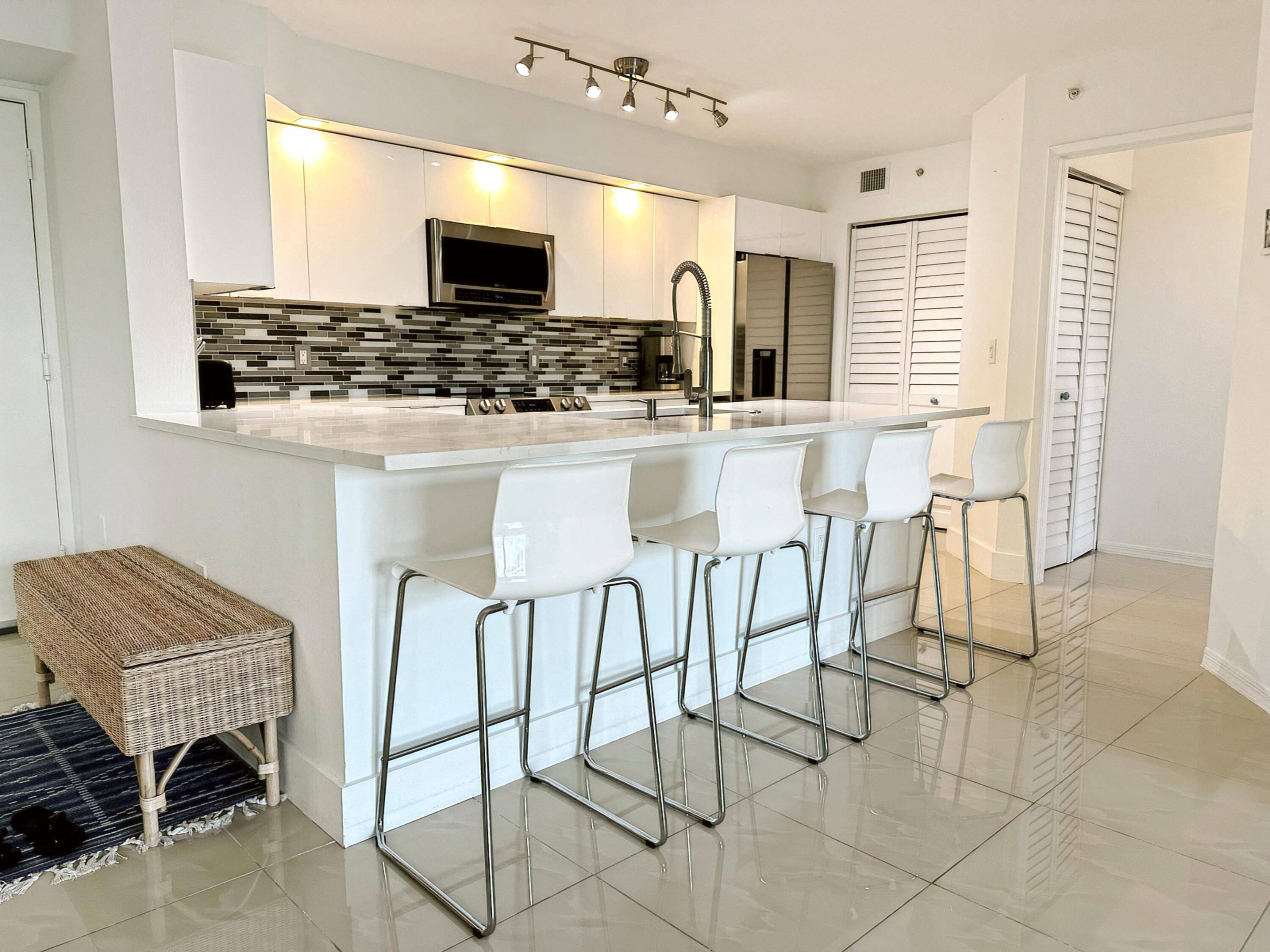 Luxury Furnished Condo in Prestigious Highland Beach Club 4500 annual 8000 seasonal Experience resort style living in this stunning 2 bedroom, 2 bathroom condo 1, 400 sq.