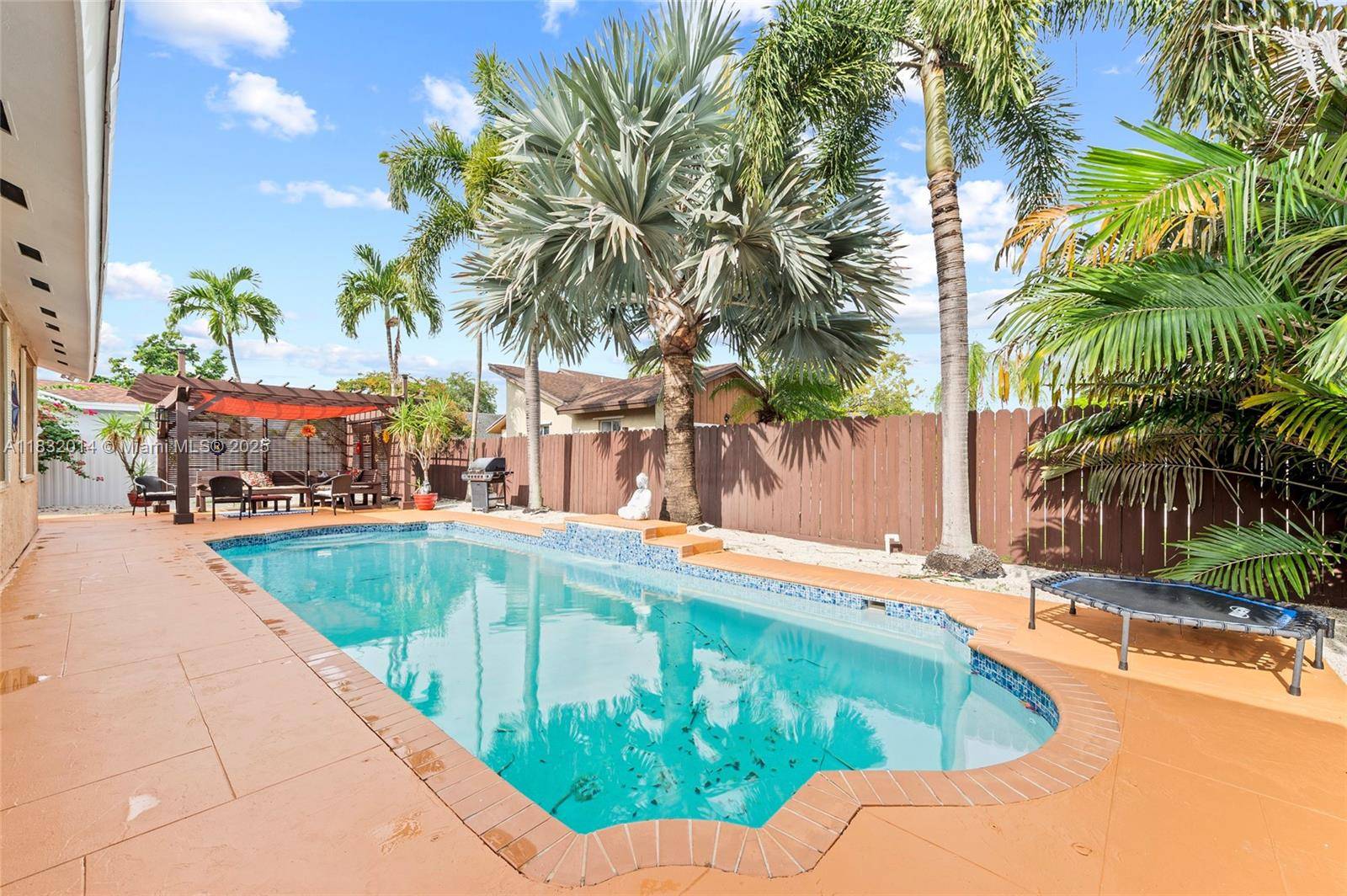 Charming 3BR 2BA single story POOL home with 2 car garage located on a quiet street in desirable Palmetto Bay.