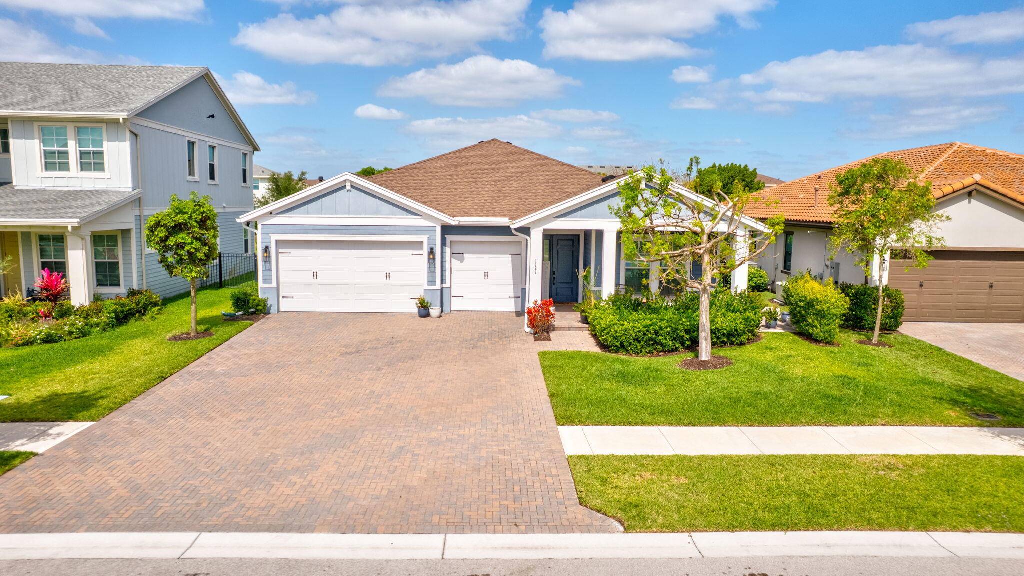 Located in the amenity rich Arden community of Loxahatchee, 1125 Deer Haven Drive is a beautifully crafted home built in 2020 that blends modern comfort with elegant design.