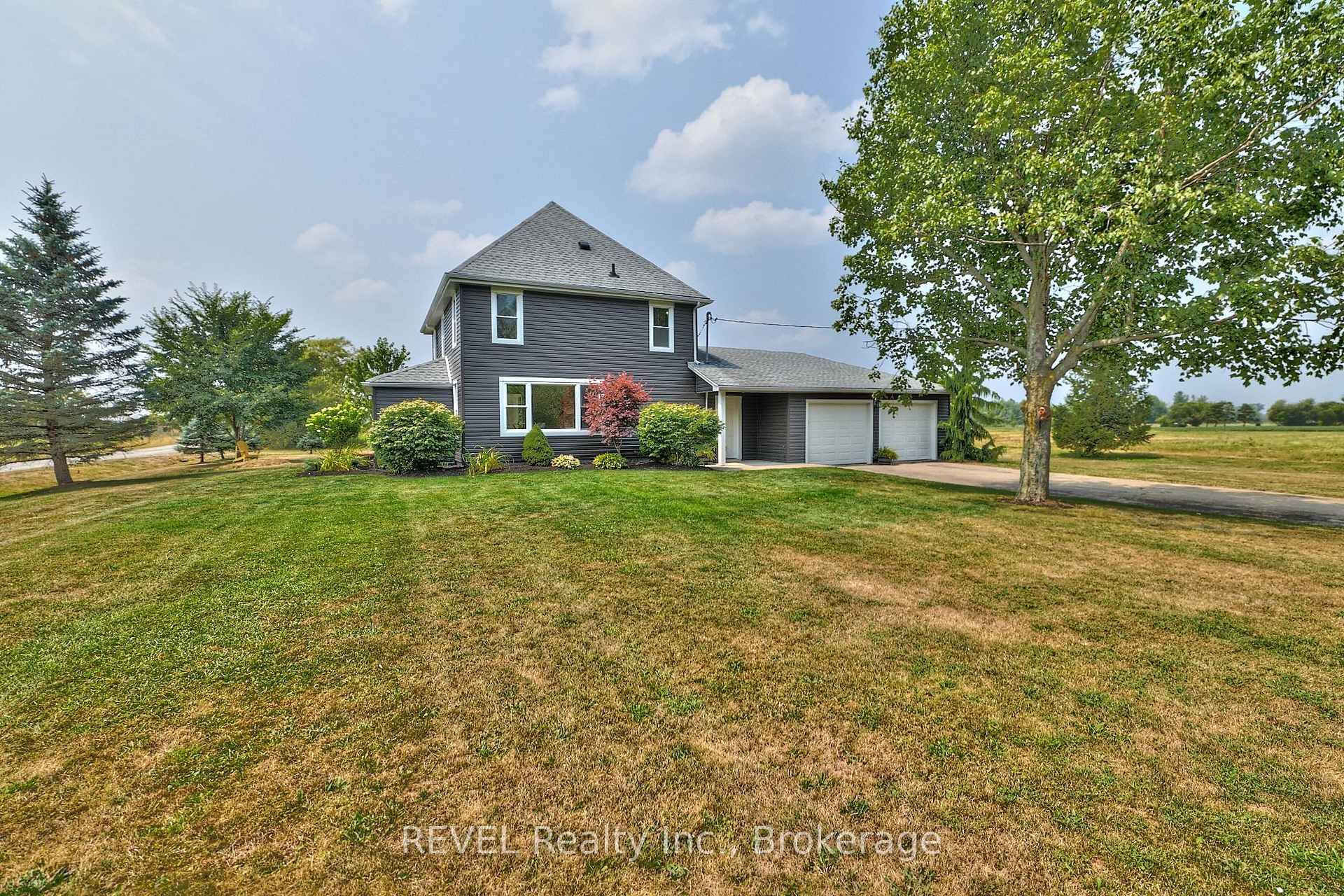 Situated on two acres in one of the most gorgeous, yet convenient locations, 13717 Ort Road offers country living without compromise !