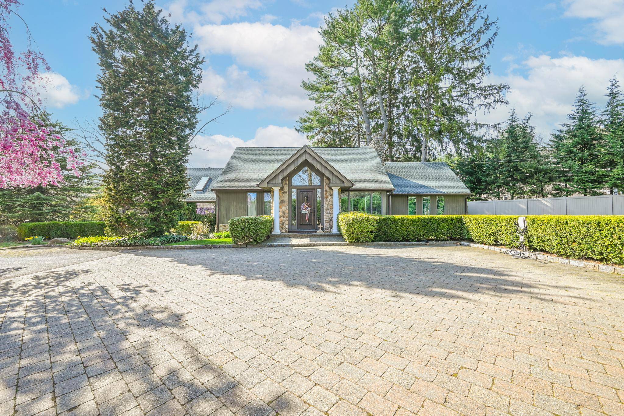 This is a beautifully unique expanded ranch that offers elegance throughout.