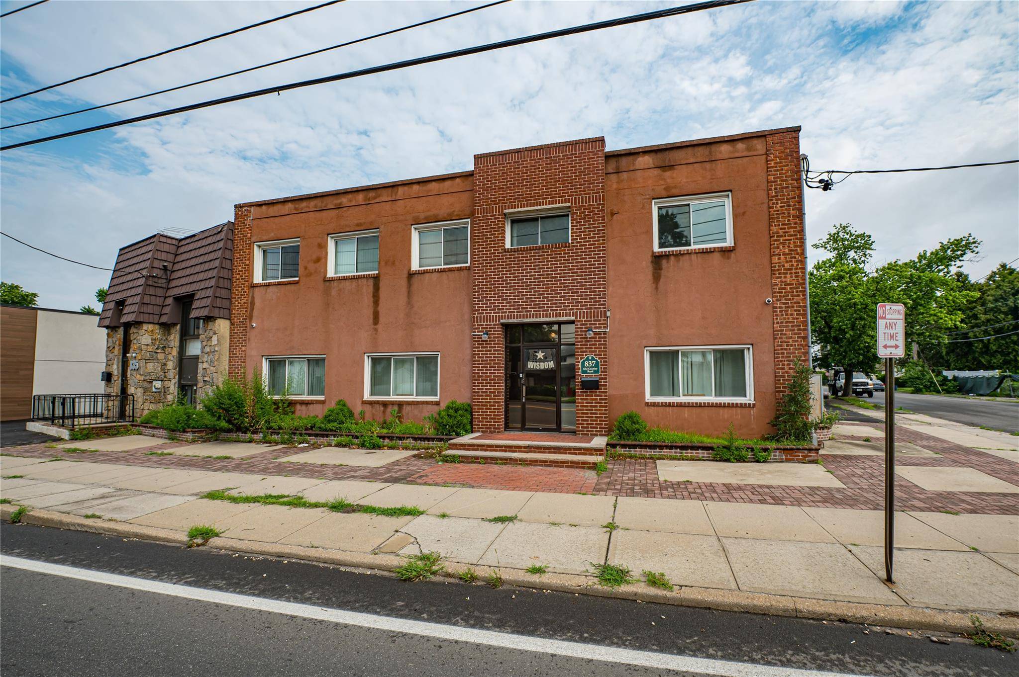 A prime commercial building located on a prominent corner spanning approximately 3, 425 square feet.