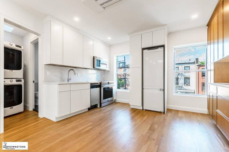 Newly renovated two bedroom Brownstone apartment in Prime Carroll Gardens featuring the folowing amenties Ductless central air, washer dryer, dishwasher, and harwood flooring.