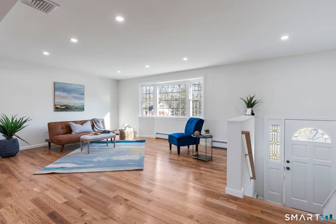 Freshly Reinvigorated Raised Ranch in a very desirable neighborhood featuring brand new hardwood flooring, a brand new kitchen with new stainless steel appliances and quartz counters ; 2 brand new ...