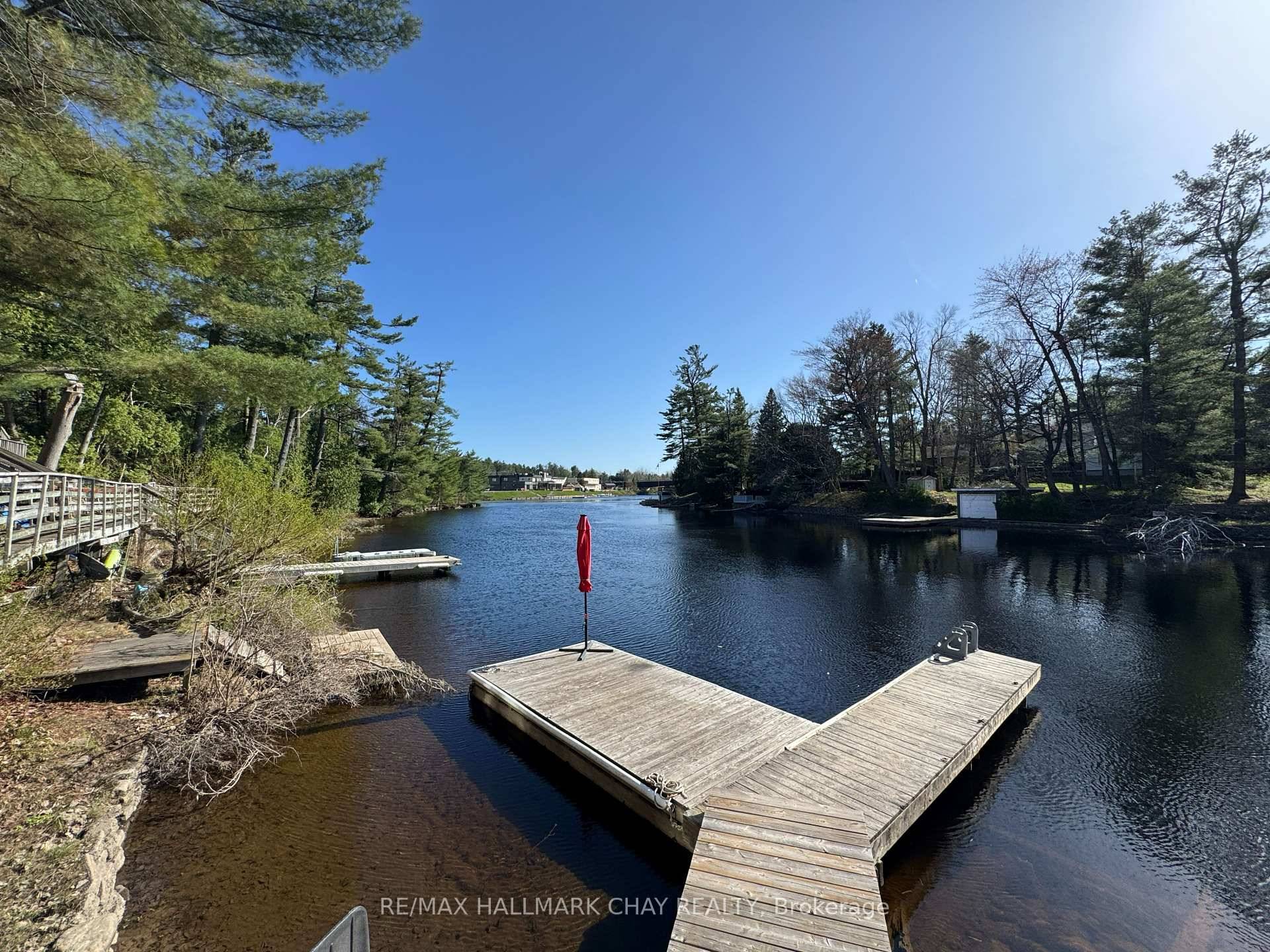 WATERFRONT PROPERTY AT A PRICE THAT LETS YOU RENOVATE !