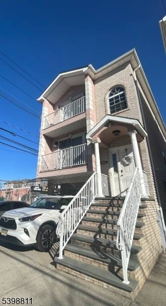 Welcome to this beautiful seven bedroom, five bath, modern two family home in Elizabeth.