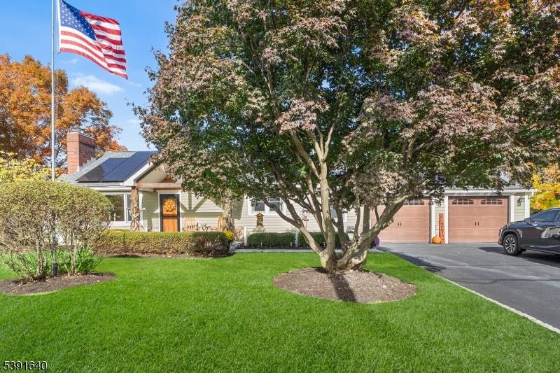 Welcome to this truly captivating, recently updated Ranch style home that perfectly blends modern sophistication with timeless charm.