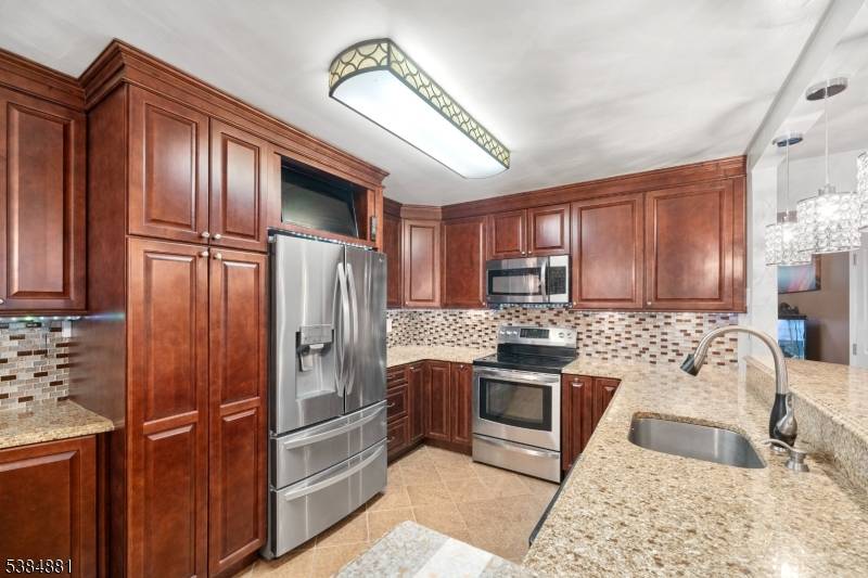 Welcome to this truly unique expanded ranch that offers endless possibilities for today's lifestyle !