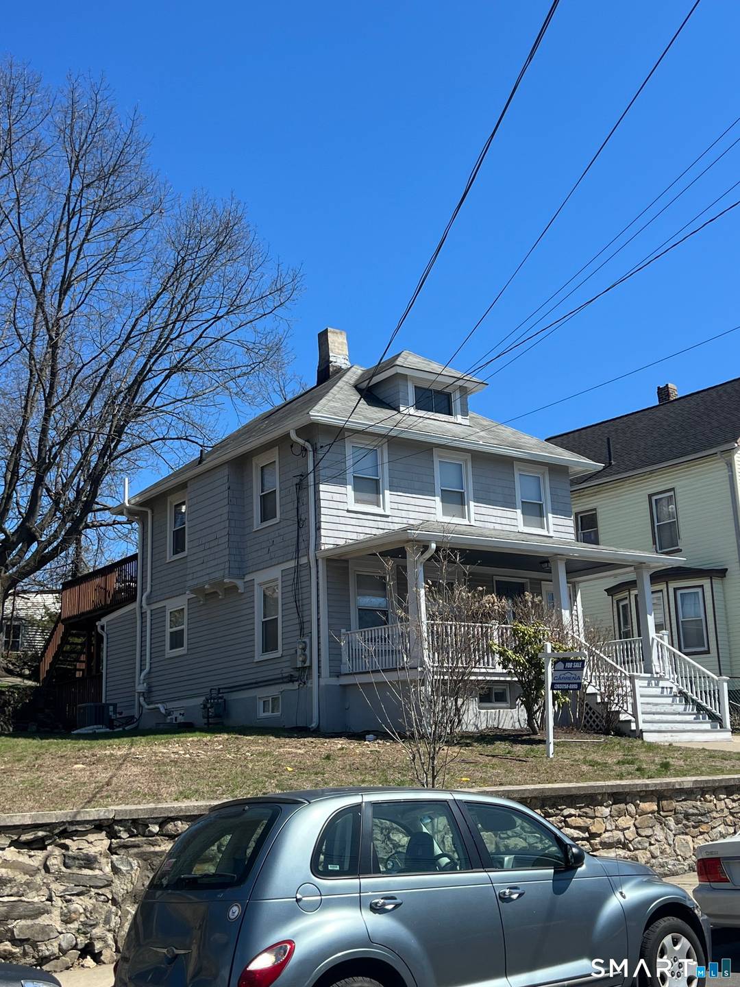 Well maintained two family Colonial offering strong owner occupant or investment opportunity.