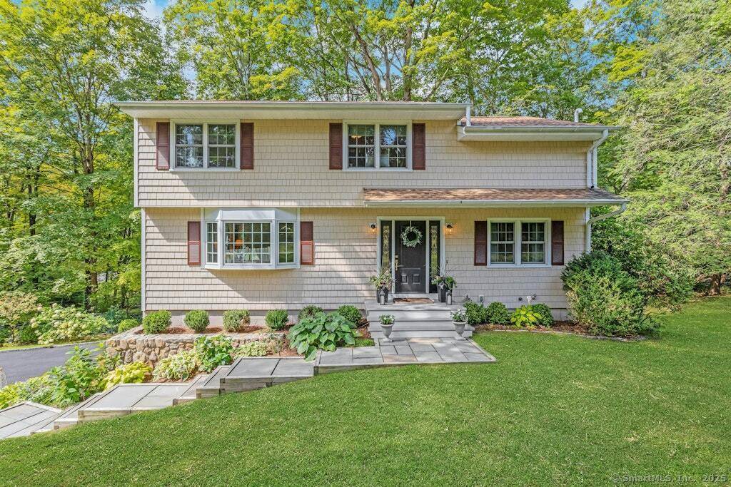 Nestled in the heart of Ridgefield's coveted south end, this exquisite four bedroom, 2 1 2 bath Colonial blends classic elegance with modern sophistication.