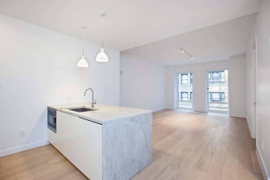 Enjoy luxurious living in the newly built stunning upscale Park Loggia condominium.