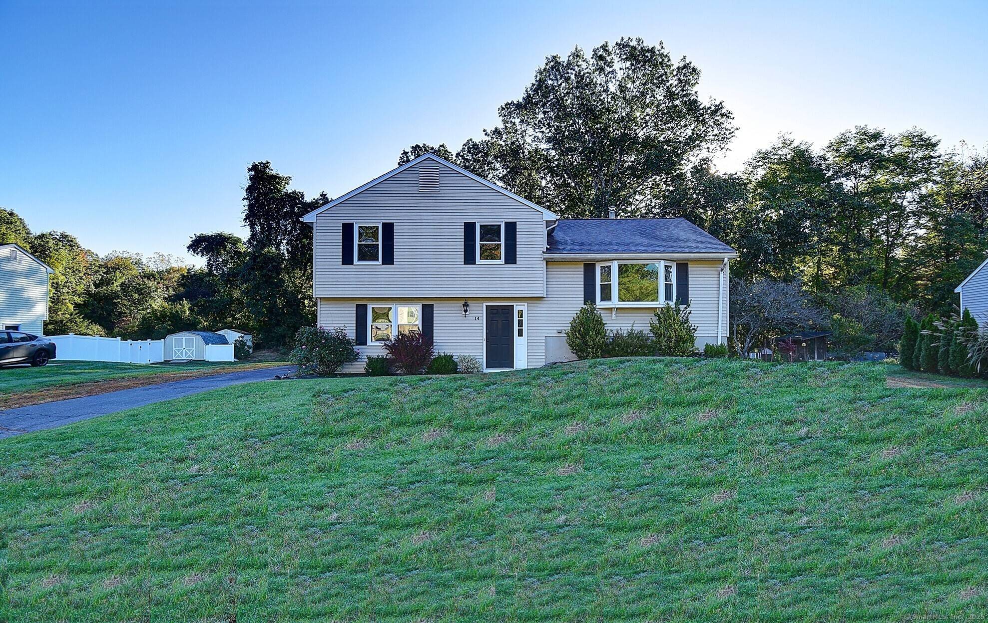 Welcome to this stunning split level home, perfectly situated in one of Farmington's most desirable neighborhoods.