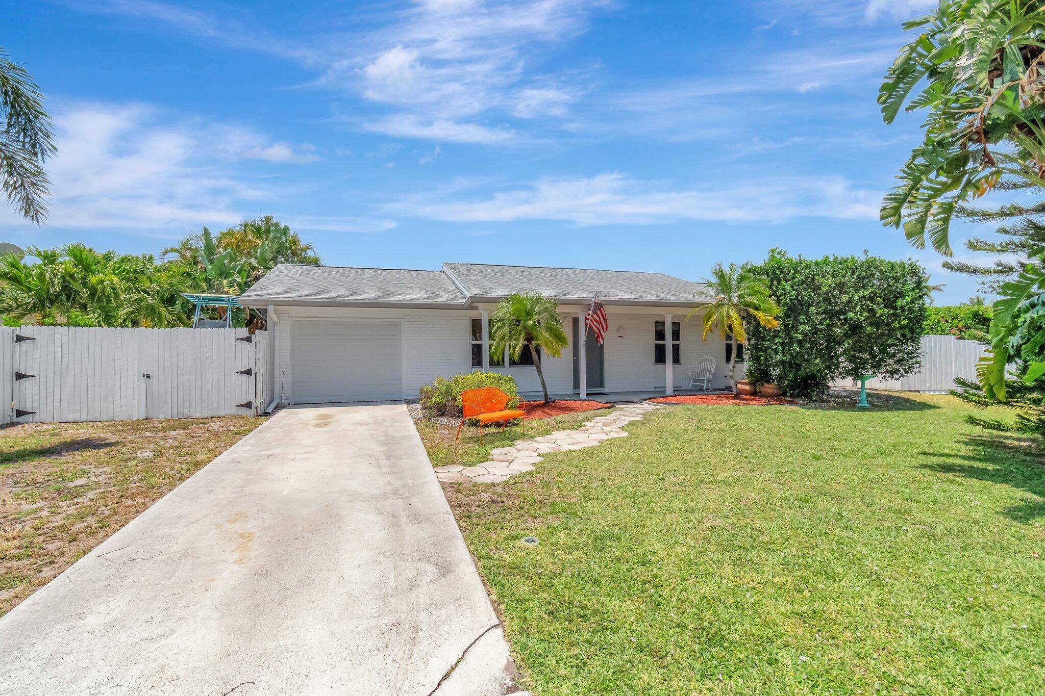 Nestled in the heart of Delray Beach's sought after Tropic Palms community, this home sits on a nice corner lot and offers three bedrooms, two bathrooms, and a spacious fenced ...