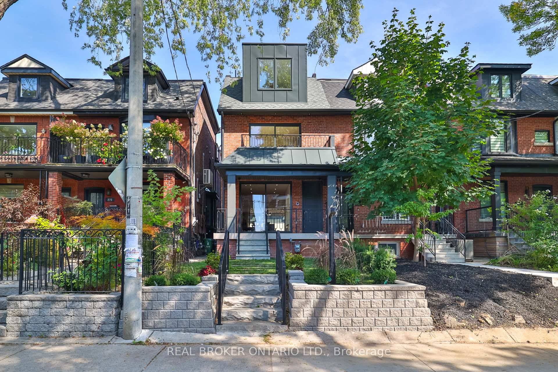High ceilings, sun filled interiors, and an air of sophistication define this fully renovated semi detached residence in the heart of Little Italy.