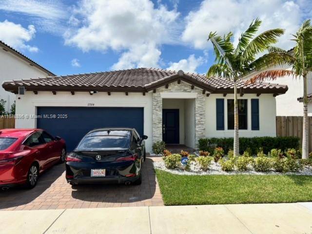 Nestled in the tranquil Estates at Silver Palm community, this modern 3 Bedroom, 2.
