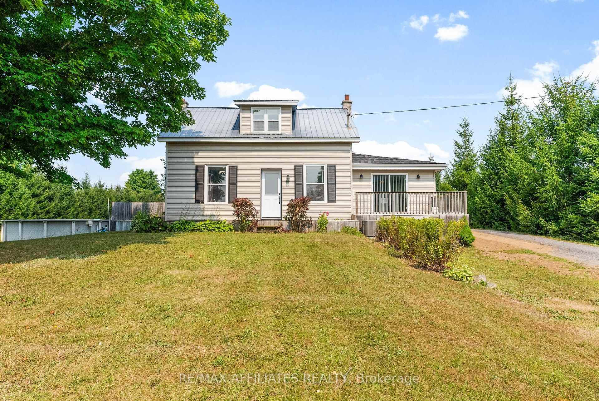 Welcome to this wonderful 1 1 2 storey country home set on a picturesque 1 acre lot, offering the perfect blend of country charm and modern updates with a unique ...