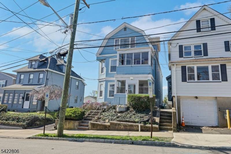 Great 2 family residence in convenient location complete with a versatile bonus third floor offering endless possibilities.