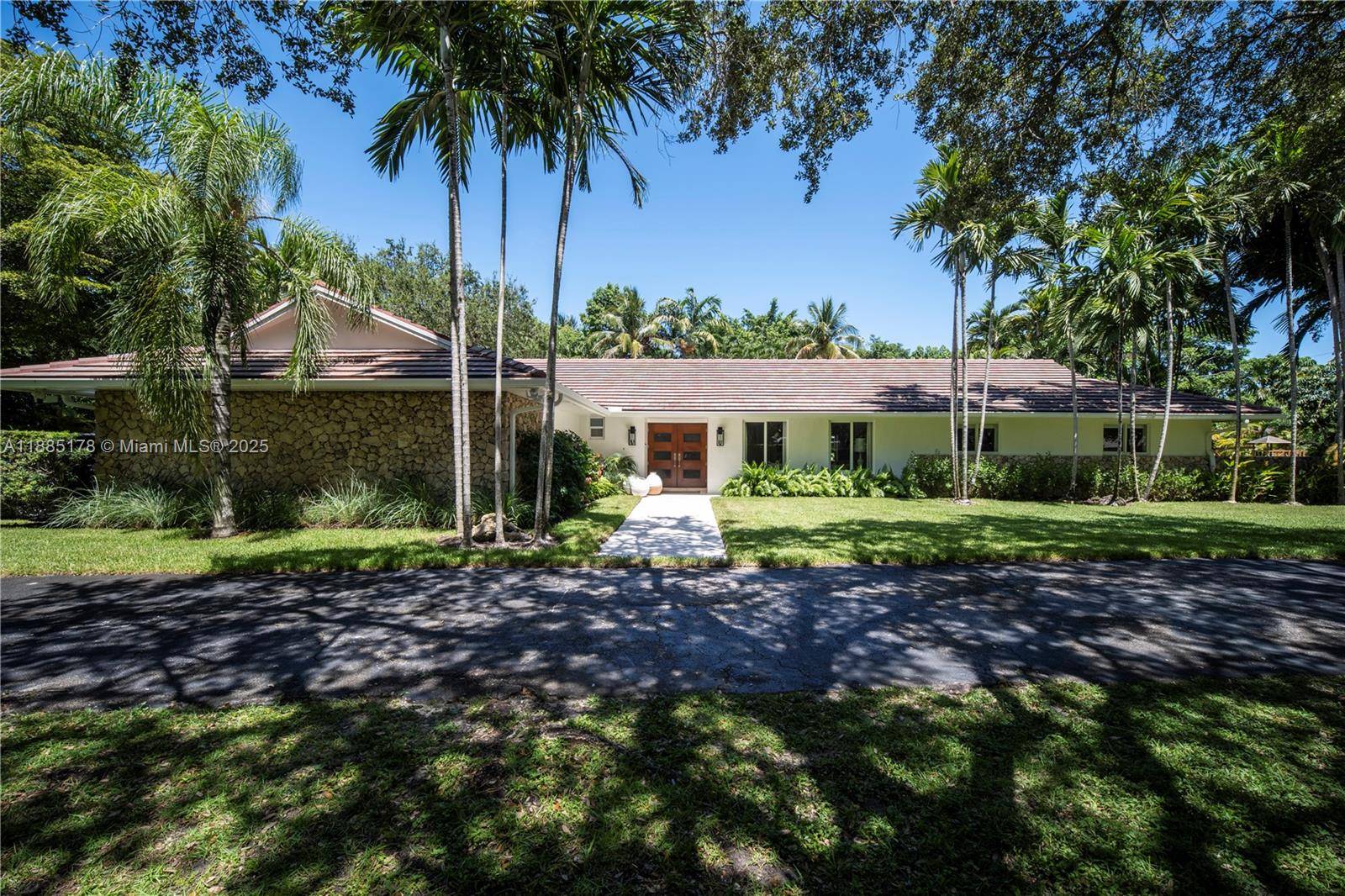Nestled on a builder s acre and framed by majestic oaks, this updated single story pool home offers the best of Pinecrest living.