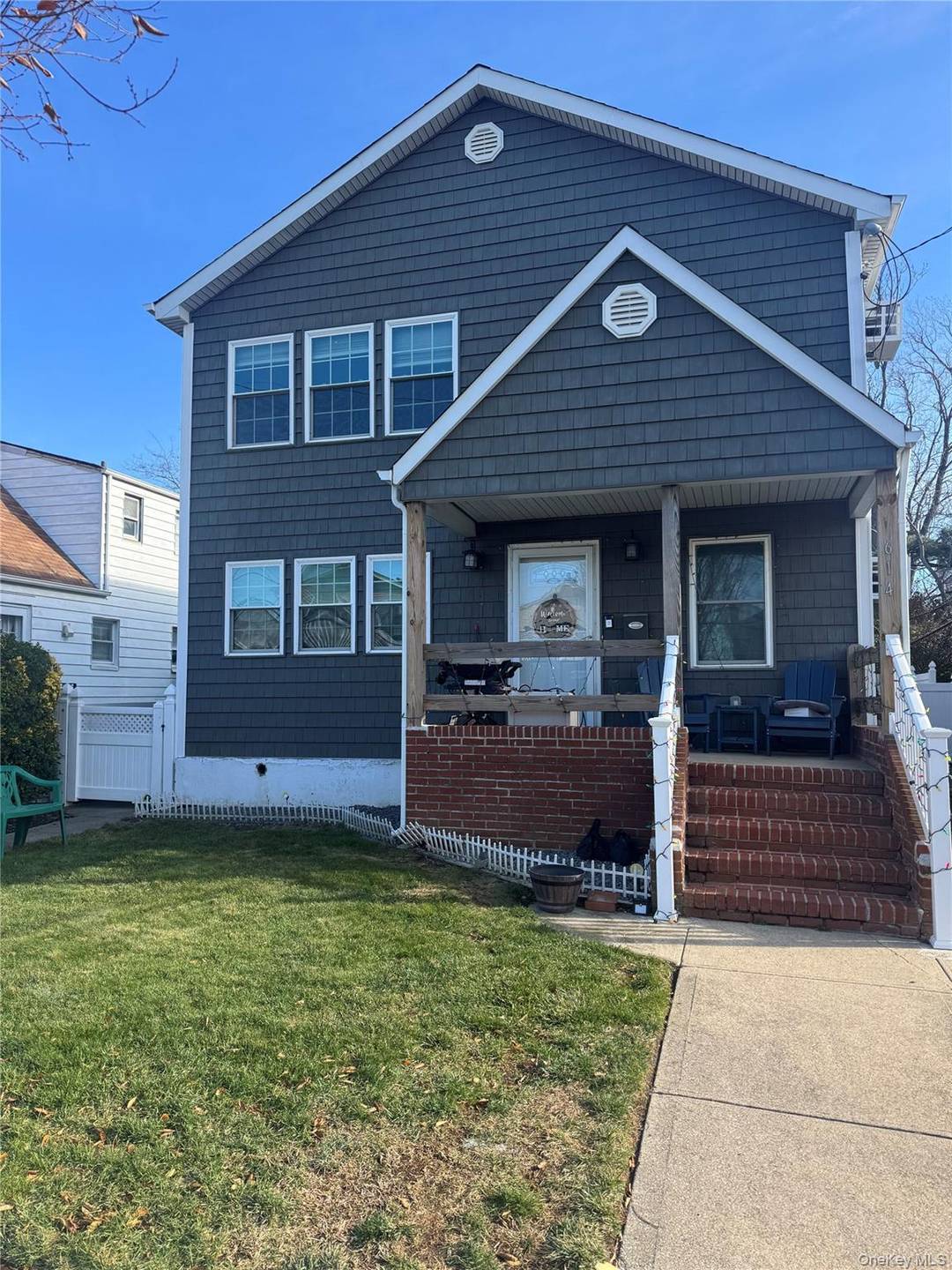 Completely renovated upper level 3 bedroom apartment featuring an open concept layout with a spacious living and dining area.