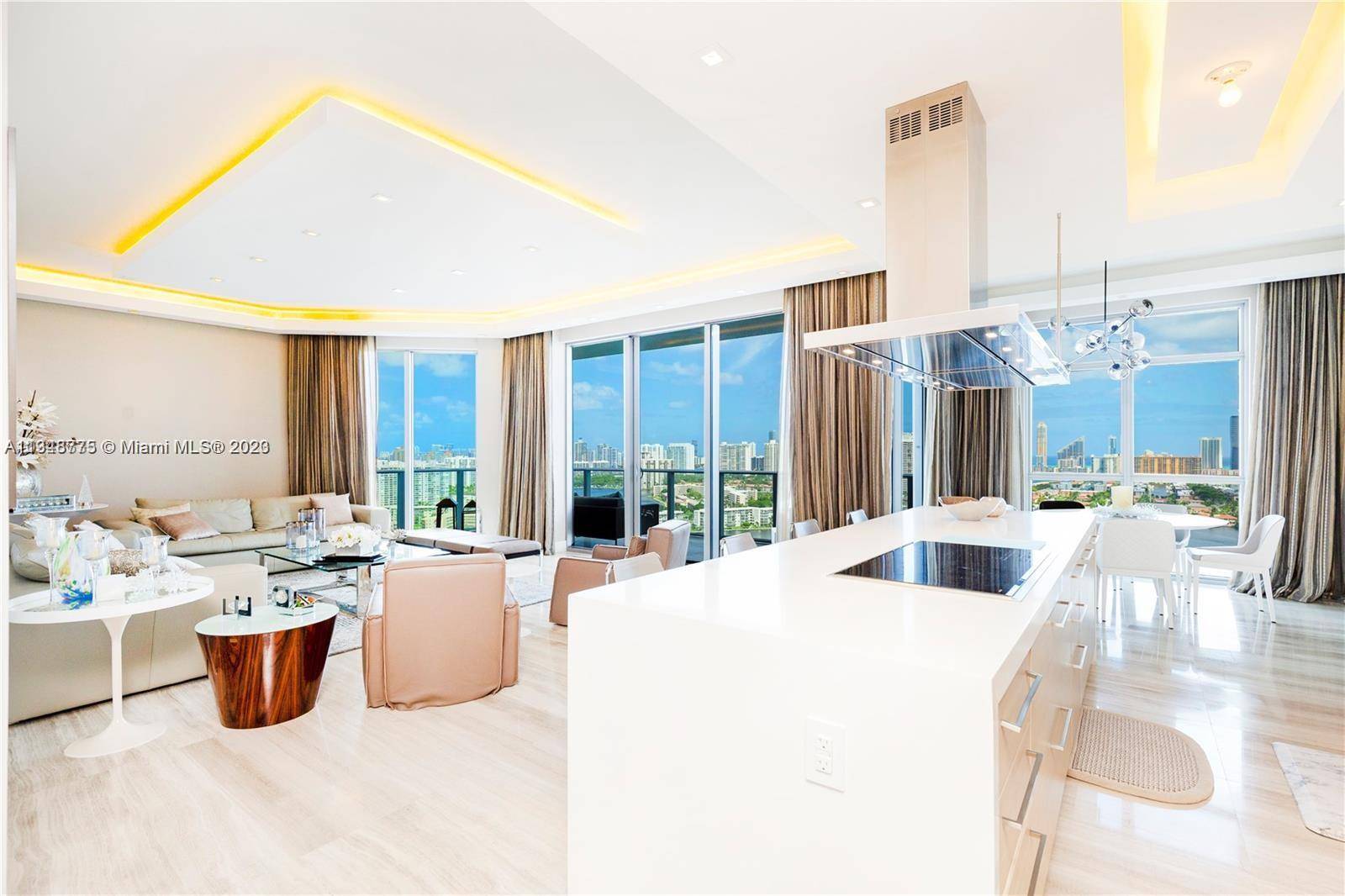 Introducing this spectacular Lower Penthouse at the Marina Palms Residences, featuring 3 bedrooms plus a den and 3.