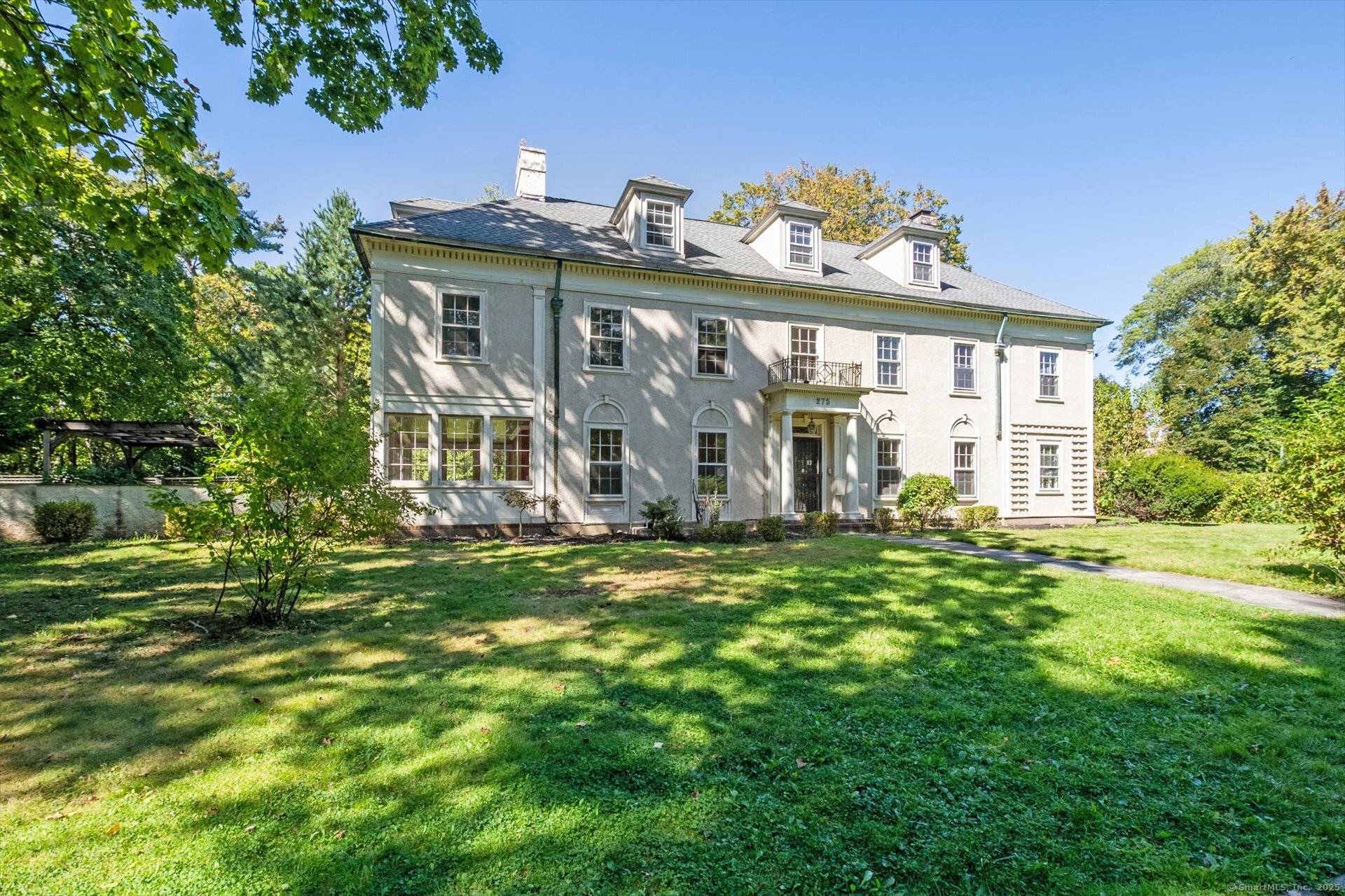 Nestled on an oversized corner lot in one of the West End's most desirable neighborhoods, this elegant Colonial offers the perfect blend of classic charm and modern updates.