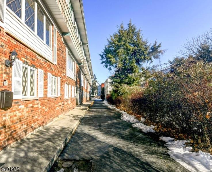 This townhouse style home features a flexible ground level living space ideal for a family room or recreation area, along with a kitchen, a full bathroom with a stand up ...