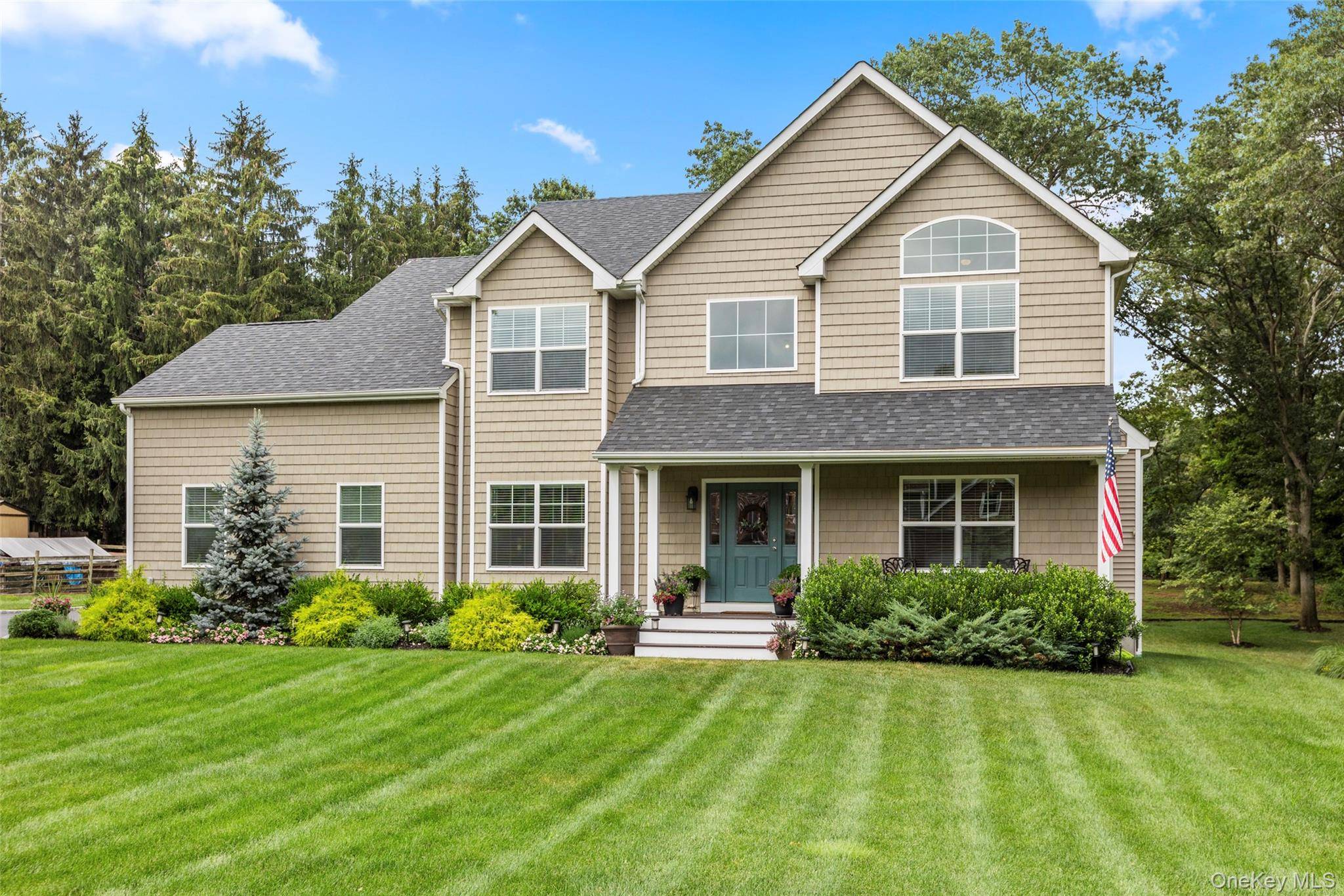 Tucked away at the end of a quiet cul de sac and backing up to the 5, 000 acre Rocky Point Pine Barrens, this 4 bedroom, 2.