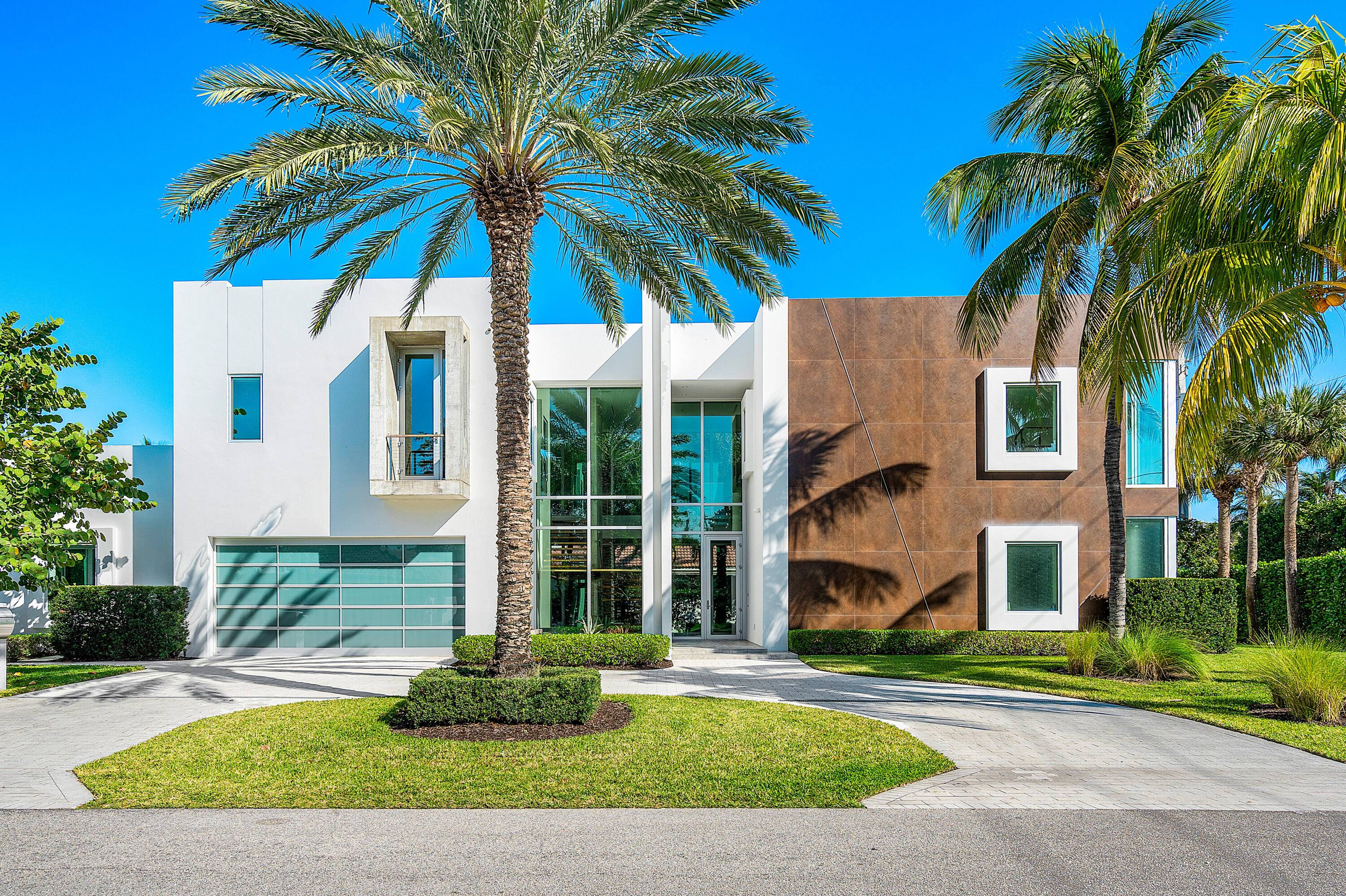 Experience the ultimate in contemporary Florida living with this stunning tropical residential smart home.