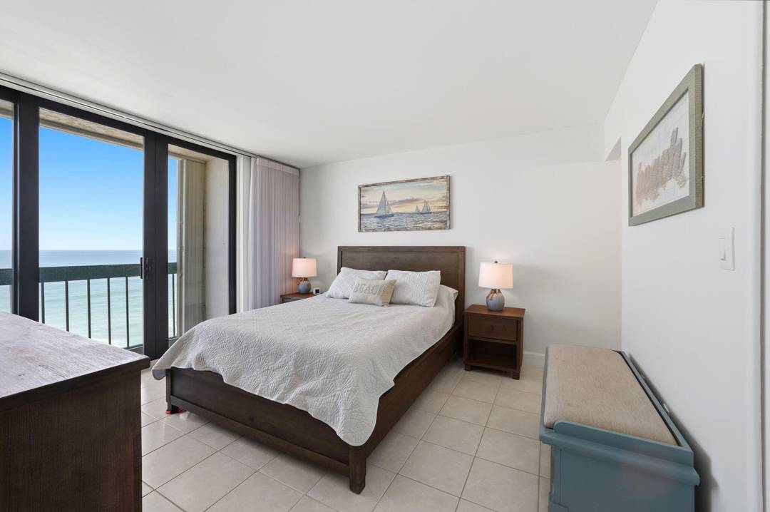 Paradise by the sea awaits at Oceana North 1 in this casually coastal themed condo directly on the Atlantic Ocean.