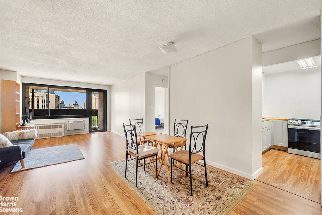 Step into this serene, oversized one bedroom home and you're immediately welcomed by a wall of windows showcasing sweeping views of Manhattan.