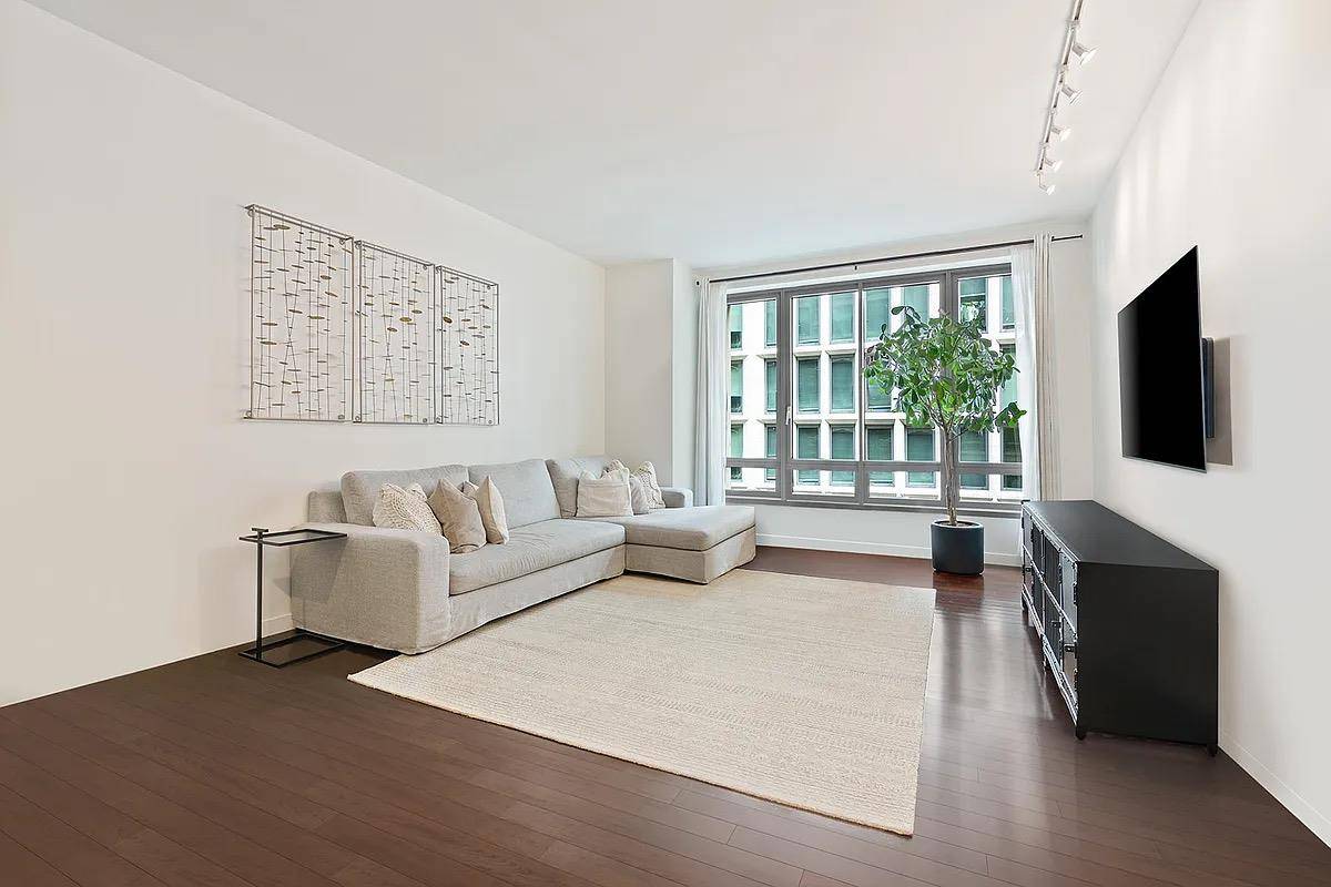 Step into contemporary urban sophistication in this impressive two bedroom, two and a half bath modern loft, ideally located in the dynamic Flatiron neighborhood with the convenience of a 24 ...