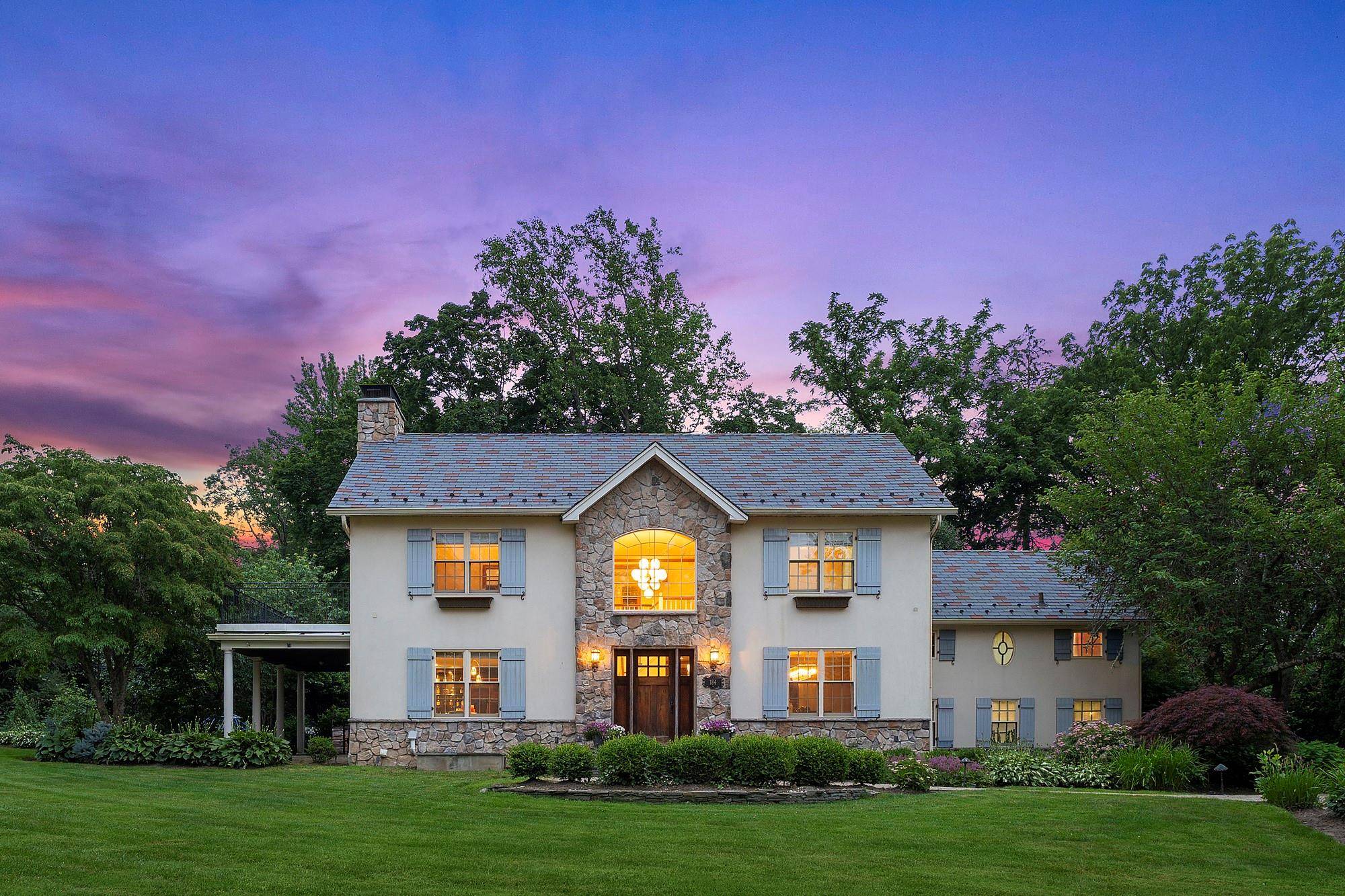 Welcome to this stunning, renovated Center Hall Colonial offering 5 bedrooms, 4.