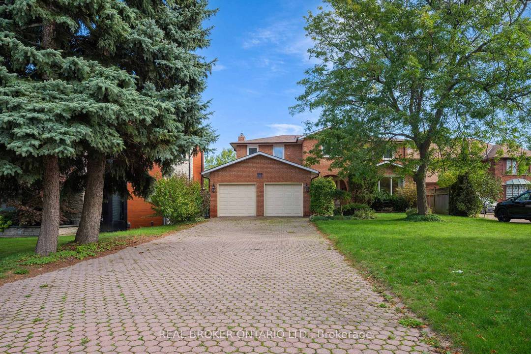 Sun Filled Home with Stunning Lake Ontario Views on Millionaires Row !