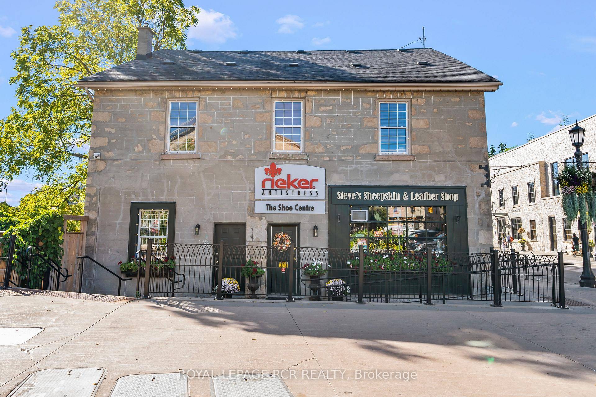In the heart of historic Elora, where cobblestone charm meets the gentle flow of the Grand River, stands a property that captures the very essence of this beloved village.