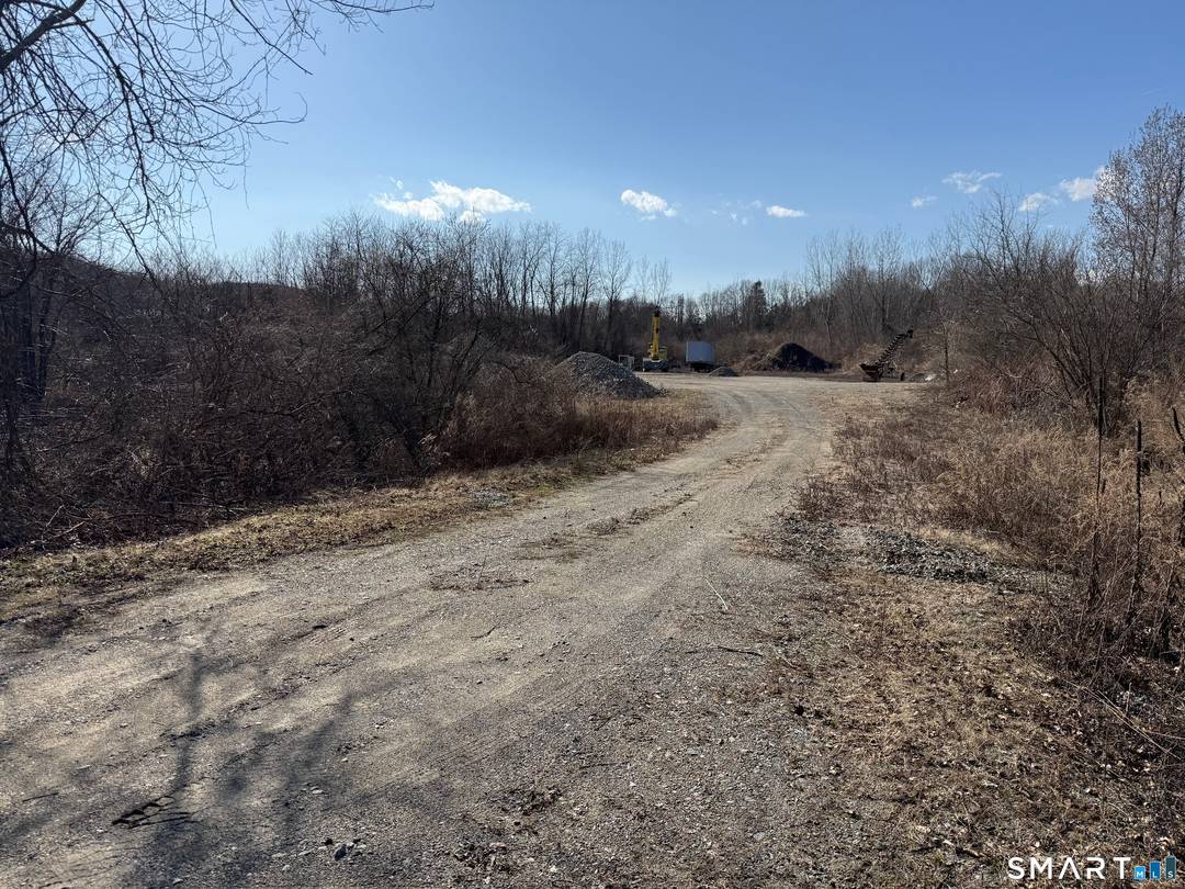 Former sand gravel operation offering exceptional potential for redevelopment as a mixed use project.