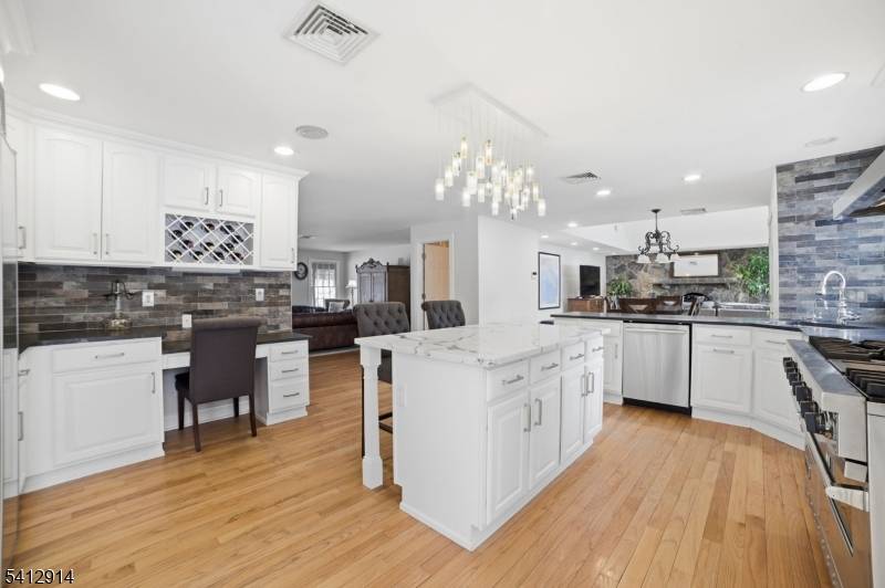 PRIME LOCATION in the heart of the coveted Rolling Hill neighborhood, this exceptional residence, sitting on.