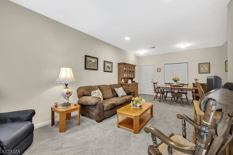 This 1st floor unit offers a spacious floor plan, a gourmet kitchen, dining room, living room w access to a veranda, 2 bedrooms, 2 bathrooms including a primary bedroom with ...