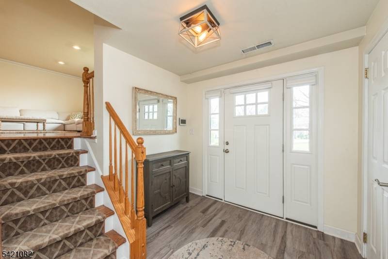 Welcome to this beautifully maintained 4 bedroom split level home, offering an exceptional blend of space, comfort, convenience in one of the area's most desirable towns.