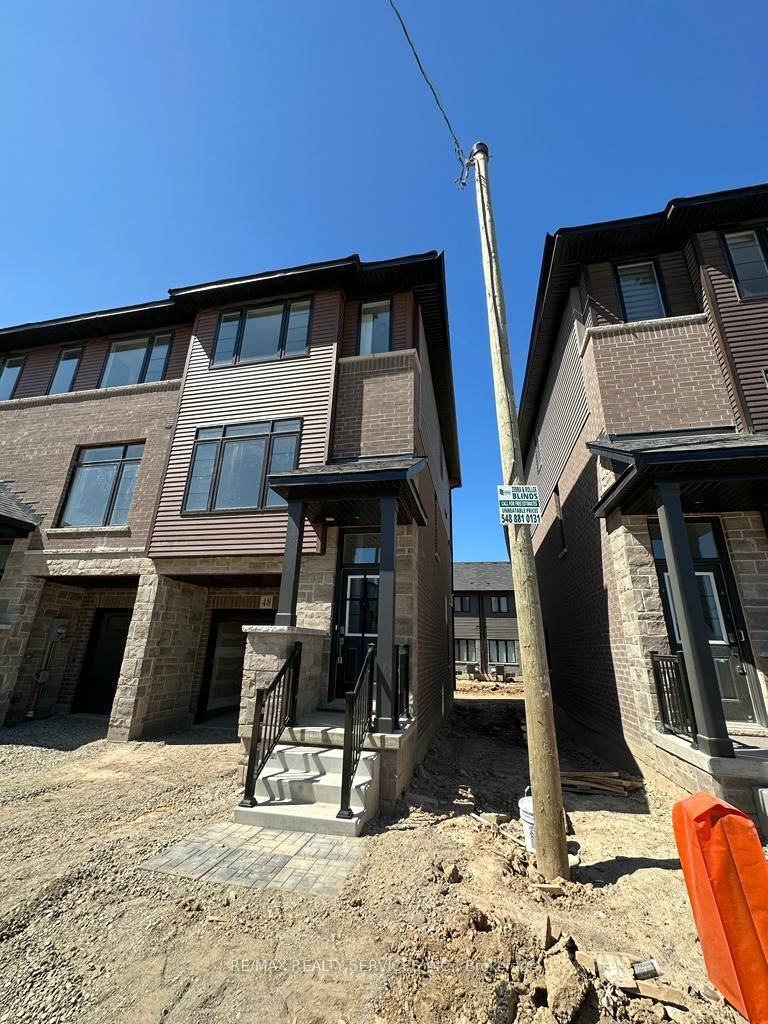 Welcome to this stunning 2023 built end unit townhouse by Losani Homes, located in the highly sought after Brant West community in Brantford.