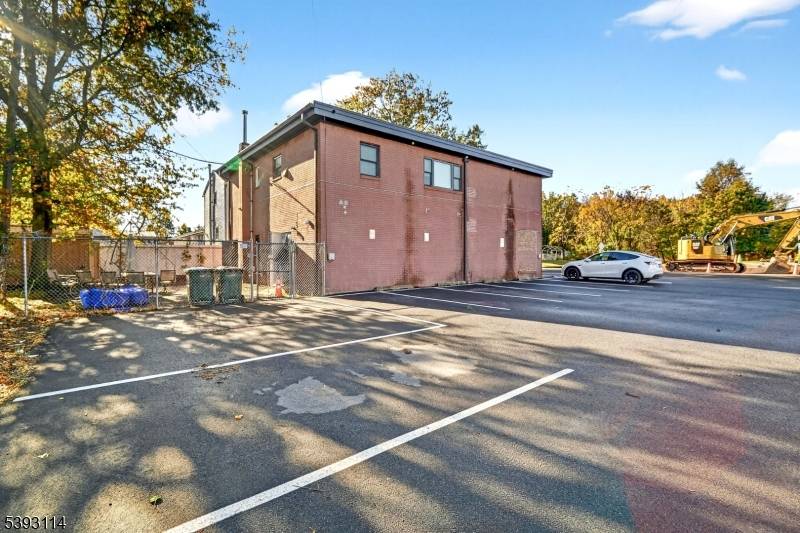 Discover an outstanding investment opportunity with this fully renovated, income generating building featuring four separate units.