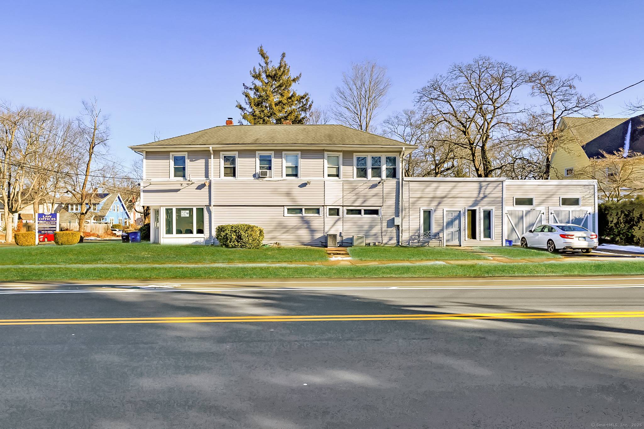 Exceptional mixed use building in a prime Westville location, adjacent to Yale Bowl, Yale Athletic Fields, Coxe Cage, and Cullman Heyman Tennis Center.