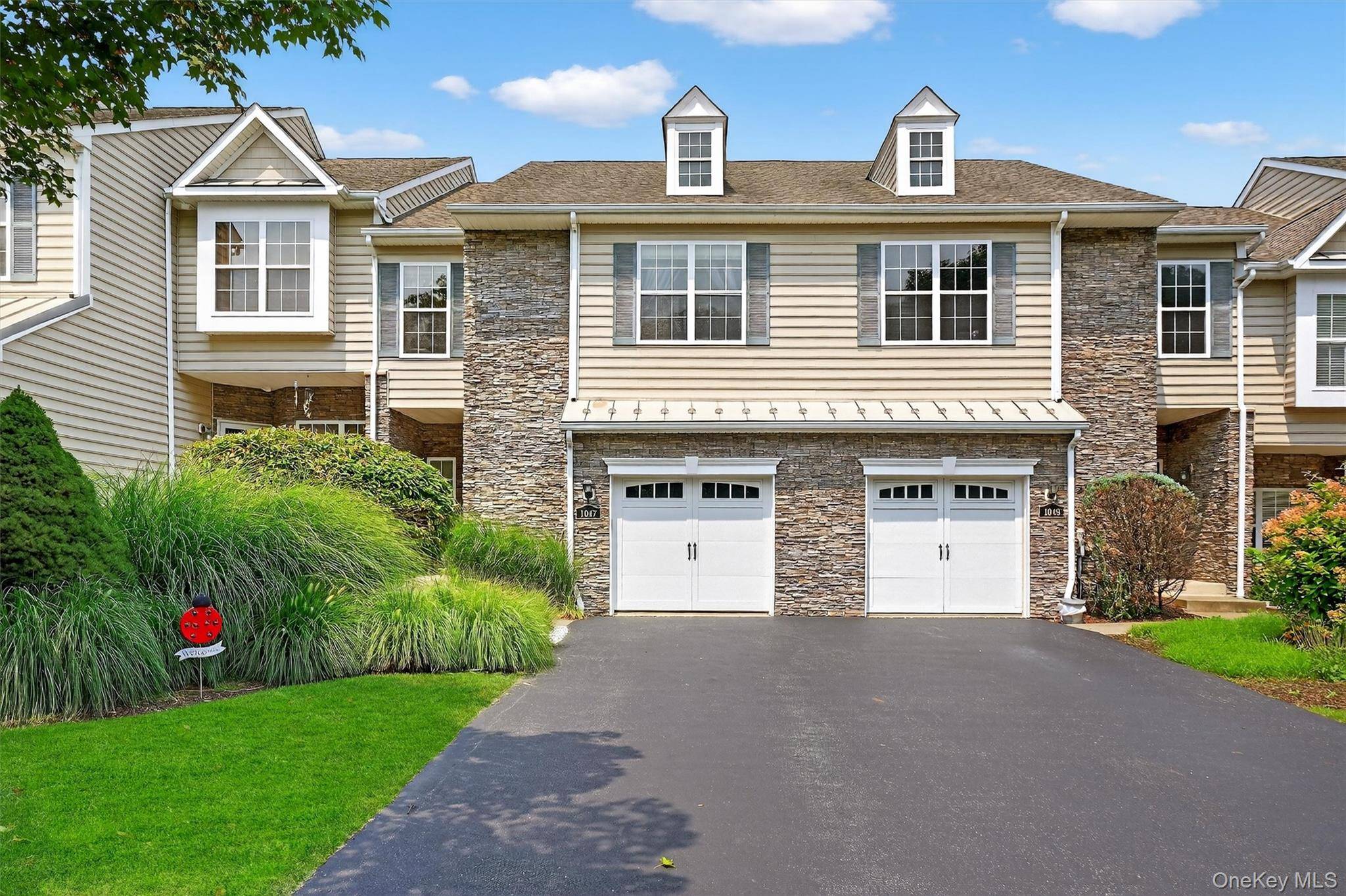 Welcome to this spacious and beautifully maintained tri level townhouse in the highly sought after Van Wyck Meadows.