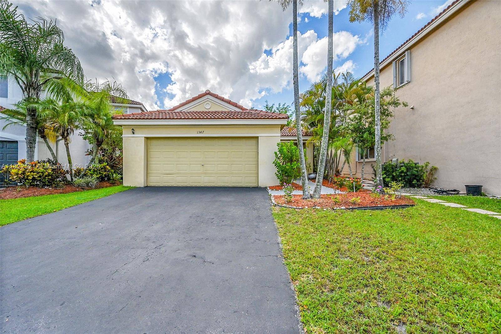 Price Just Reduced ! Come home to vaulted ceilings and sunlit living spaces where modern updates meet timeless charm.