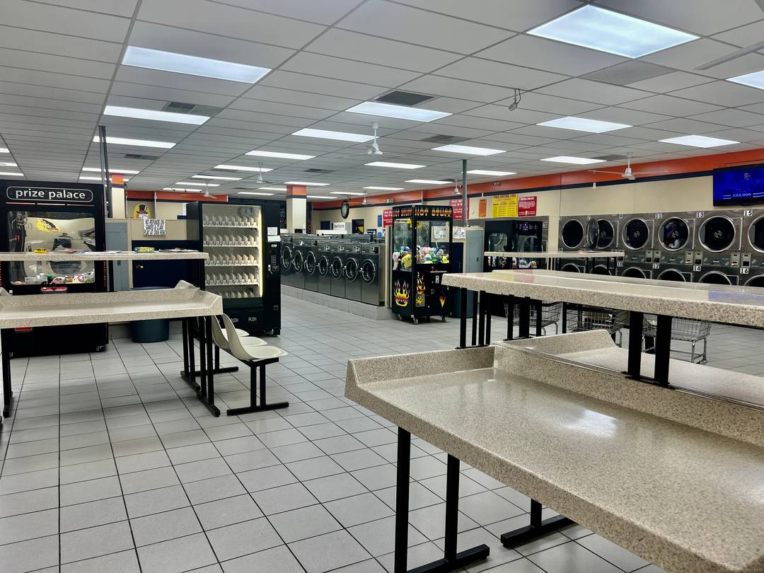 Retail shopping center strip mall with 4 5 stores a total of 15, 974 sf plus a rentable lower level with an additional 4, 182 sf.